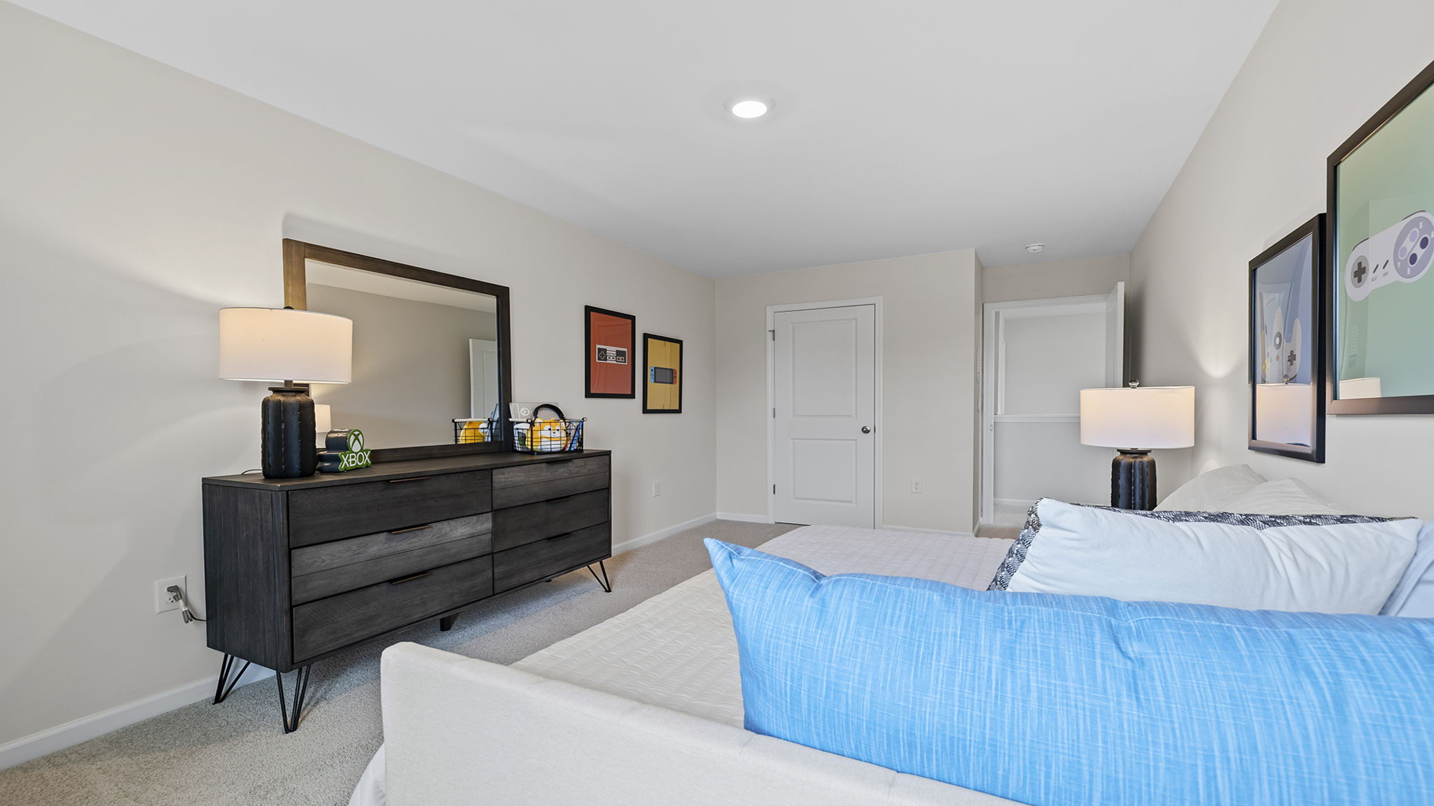 Bedroom with carpet and window.