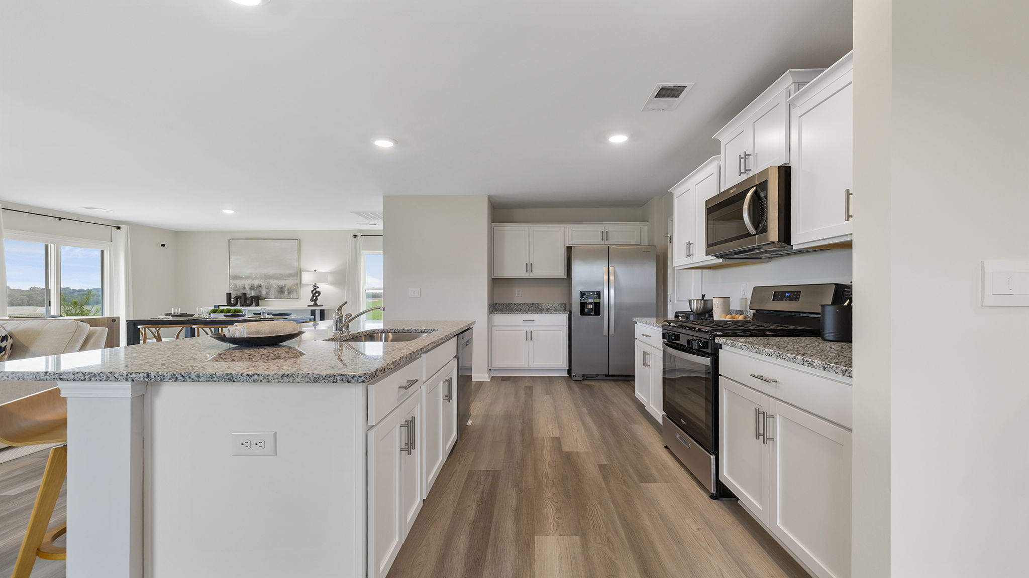 Kitchen with cabinets and island.