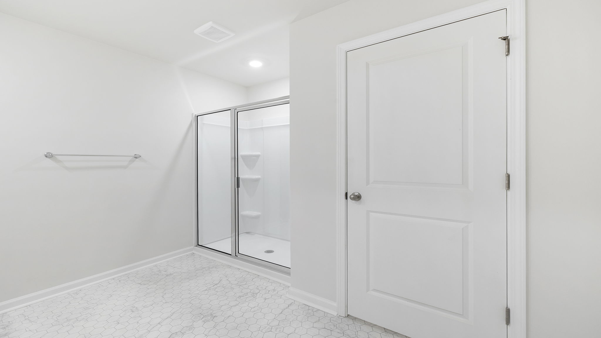Primary bathroom walk-in shower.