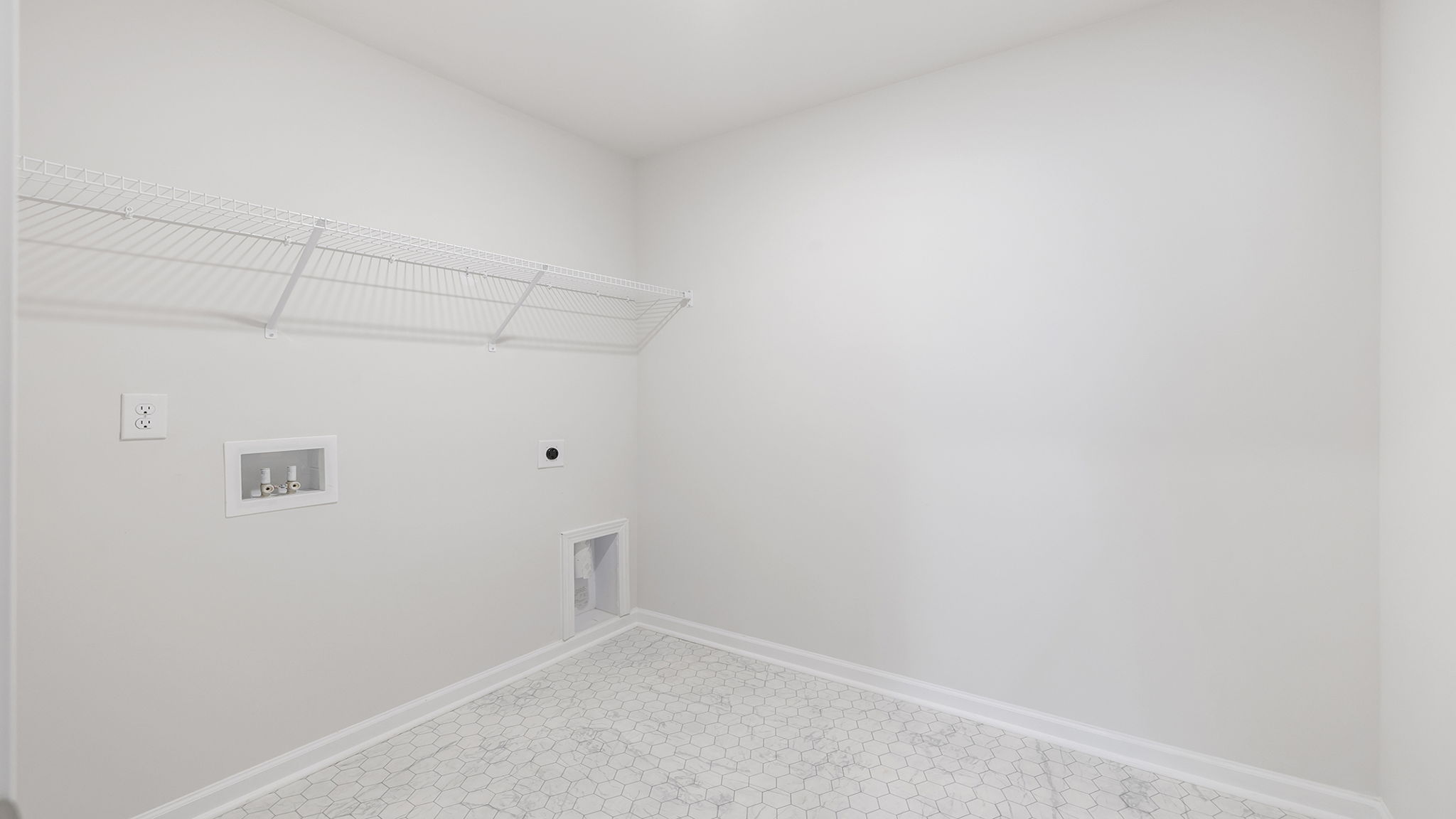 Walk-in laundry room.