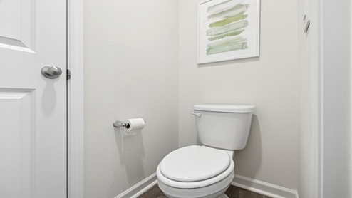 Primary bathroom with toilet.