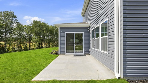 Back patio area with large backyard.
