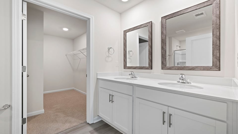 Primary bathroom with double vanity sink.