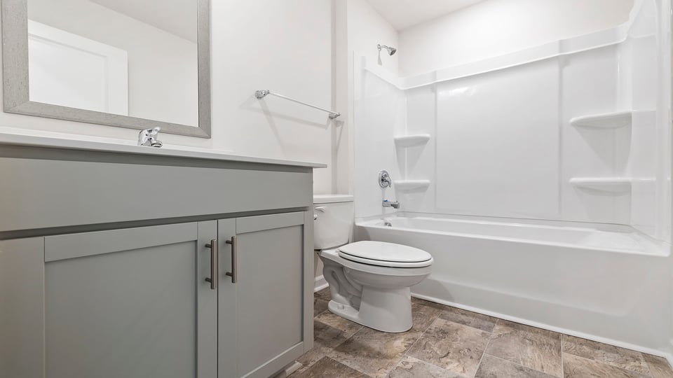 Bathroom with sink and tub.