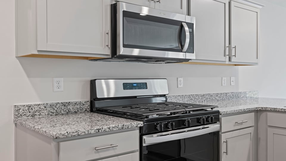 Kitchen with stainless steel appliances.