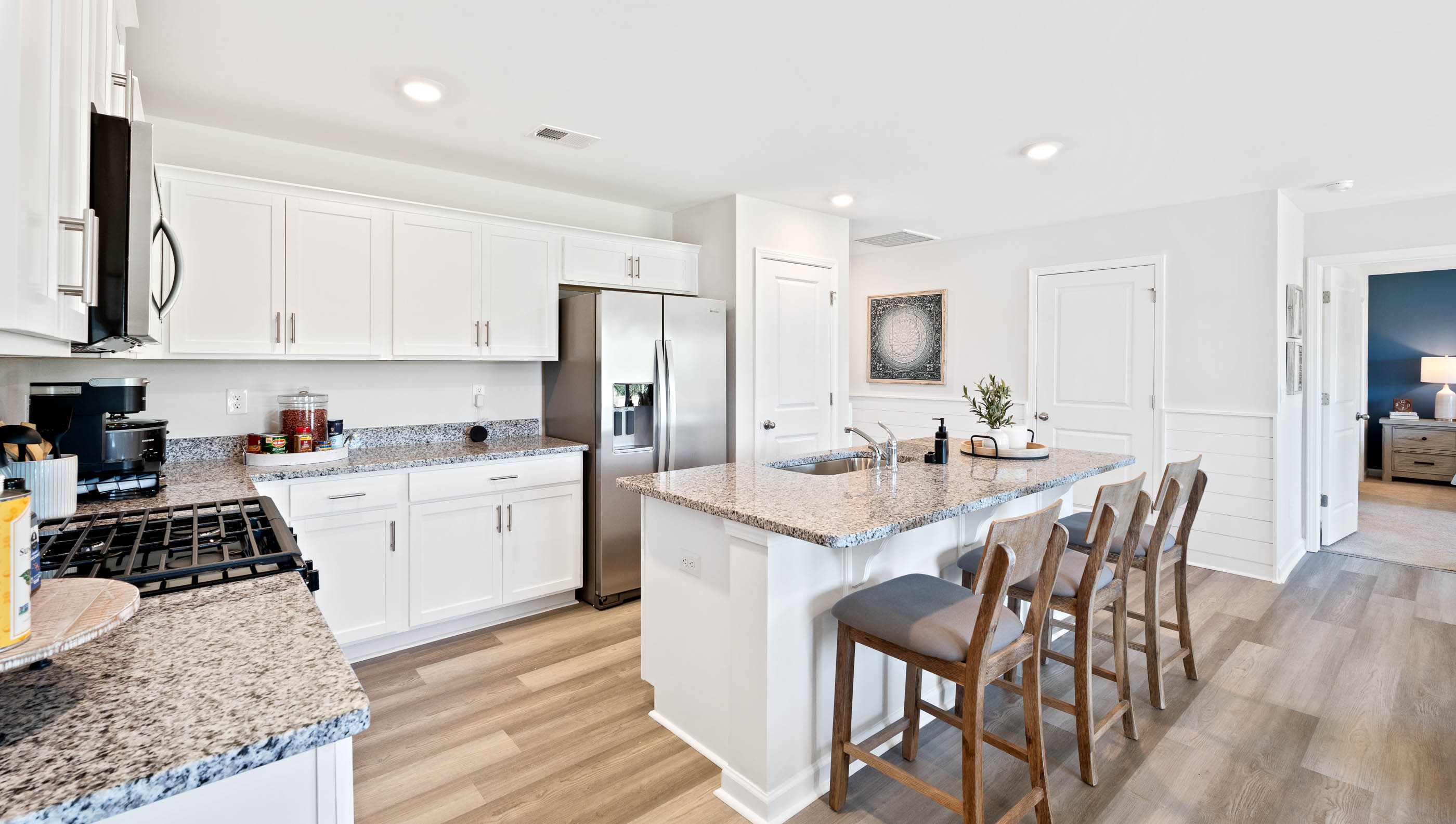 Kitchen with island and cabinets.