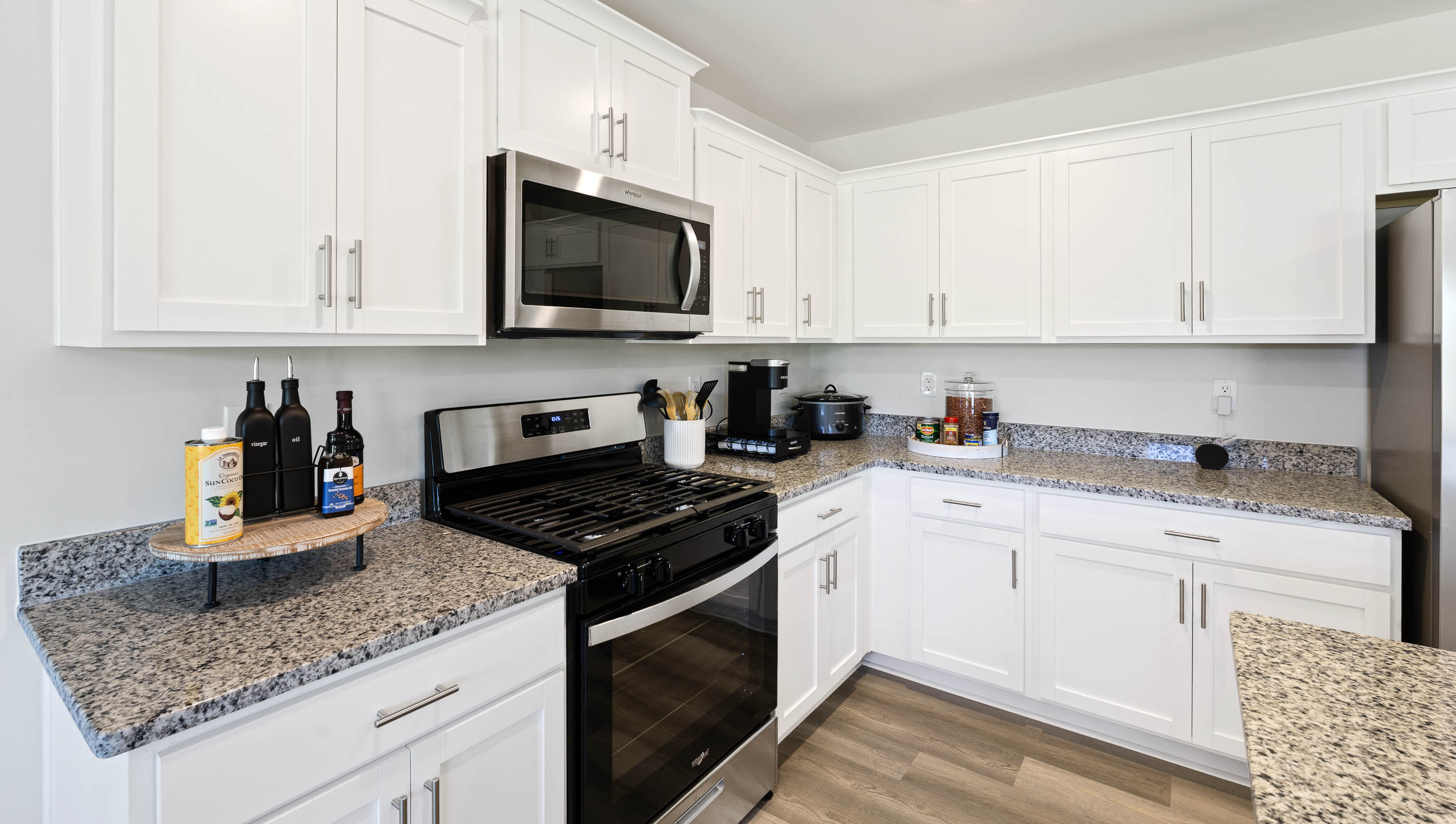 Kitchen with island and cabinets.