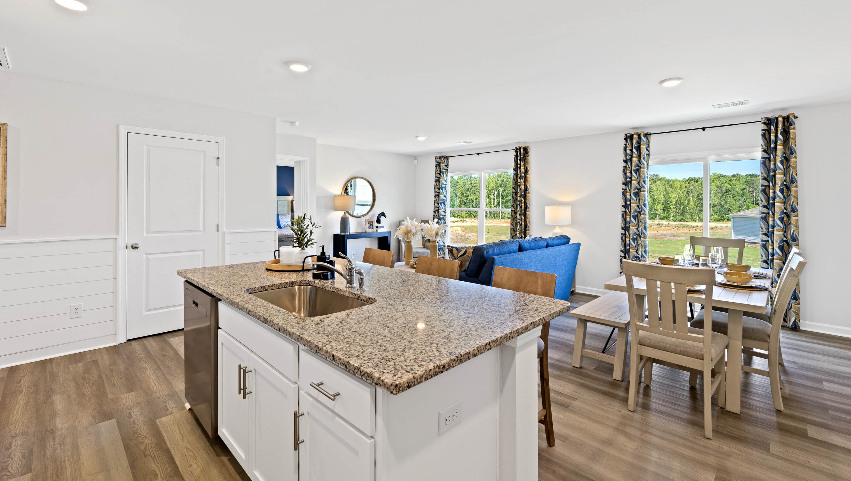 Kitchen with island and cabinets.
