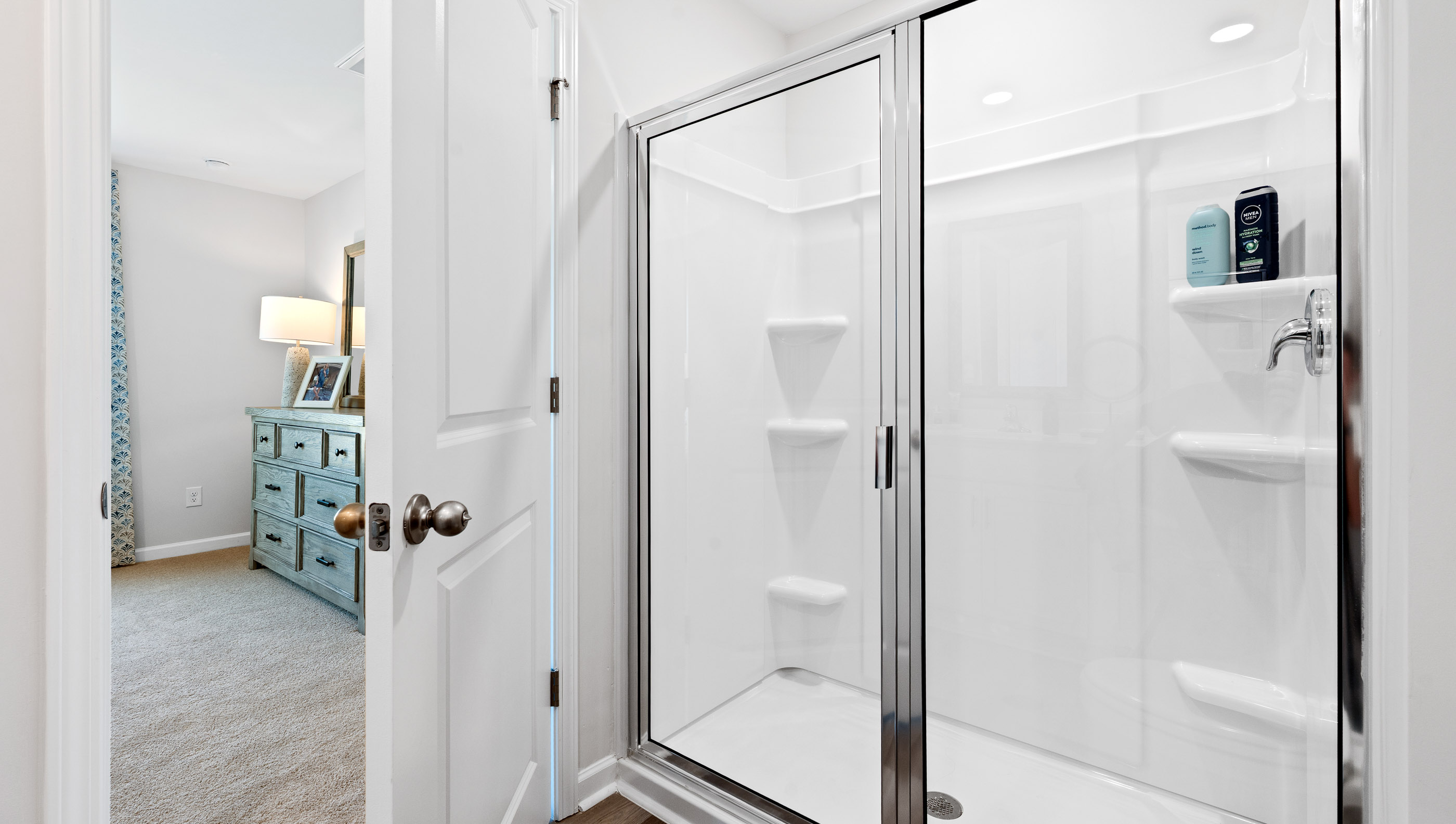 Primary bathroom with double vanity sinks.