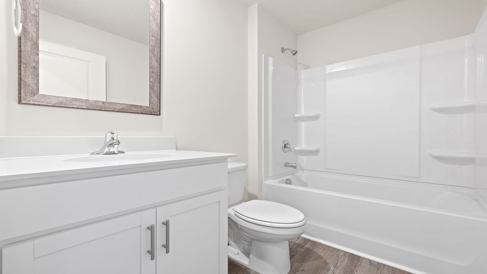 Bathroom with tub and sink.