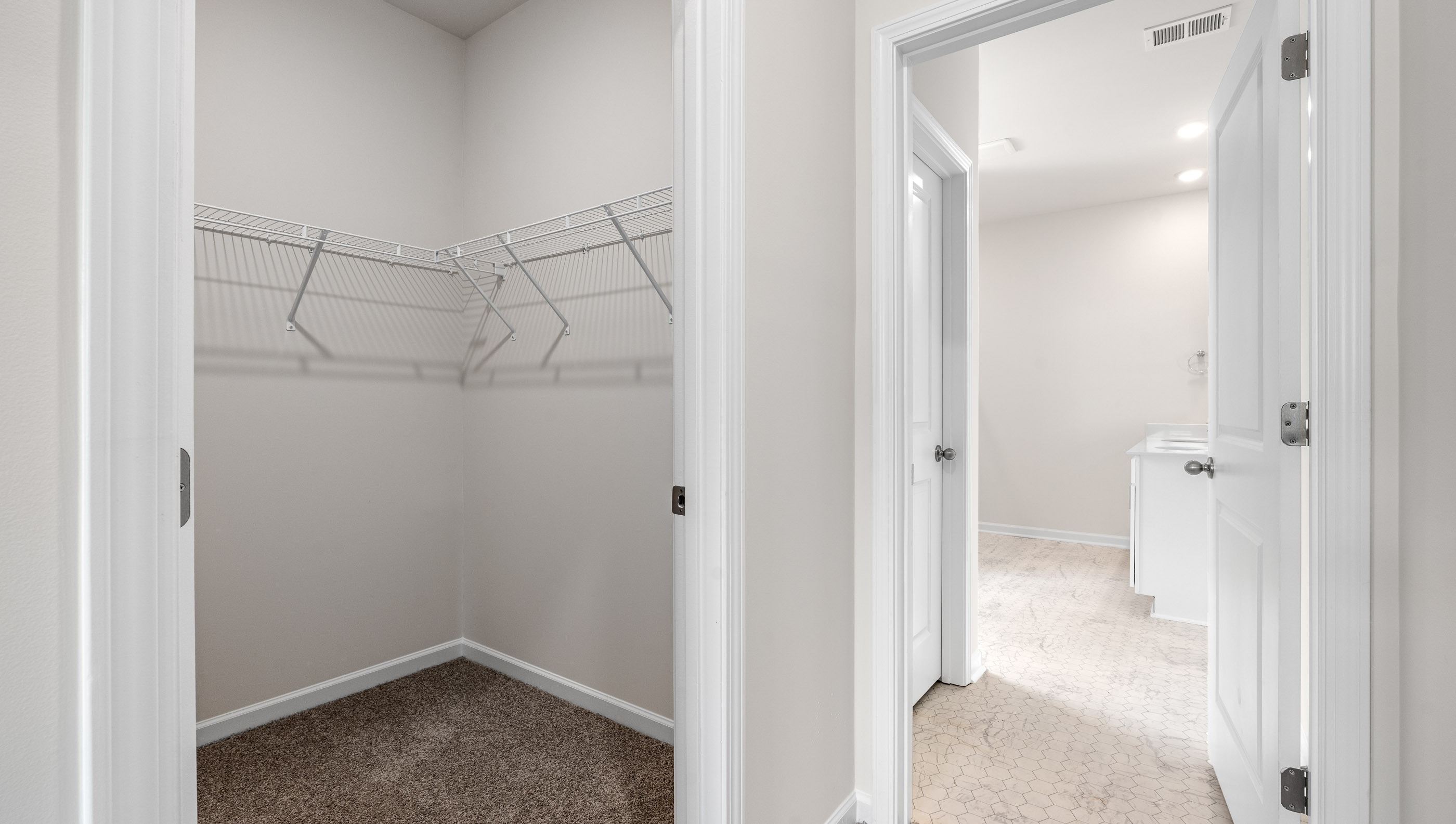 Closet with hanging storage racks.