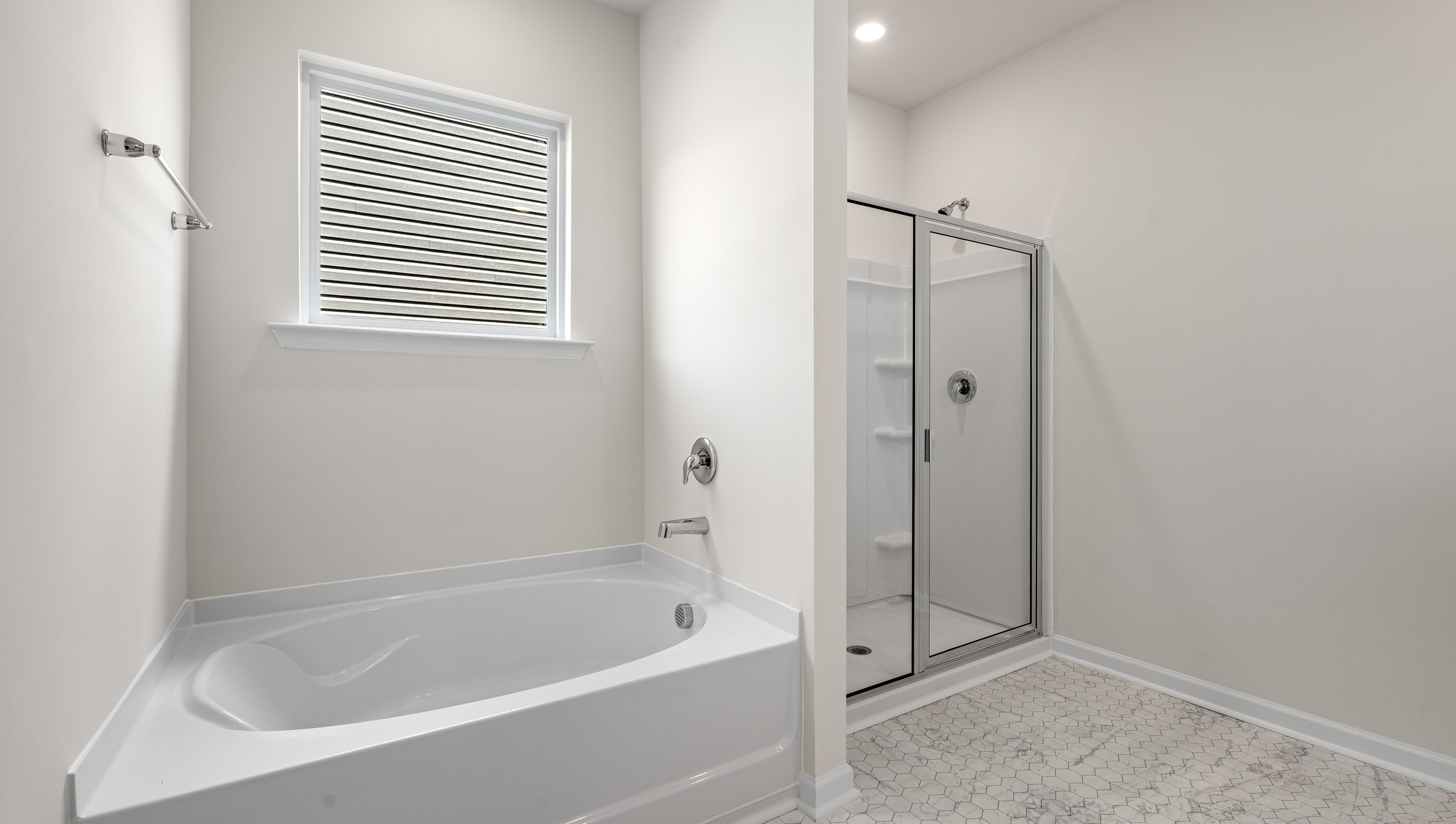 Bathroom with tub and shower.