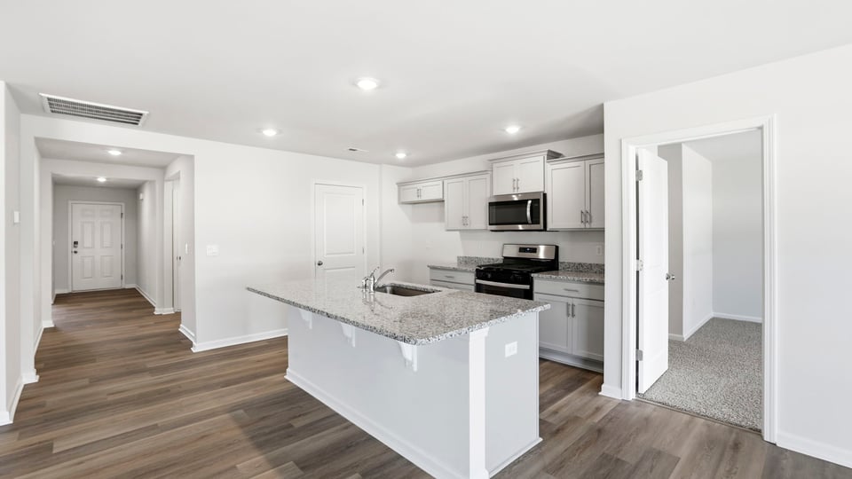 Kitchen with stainless steel appliances.