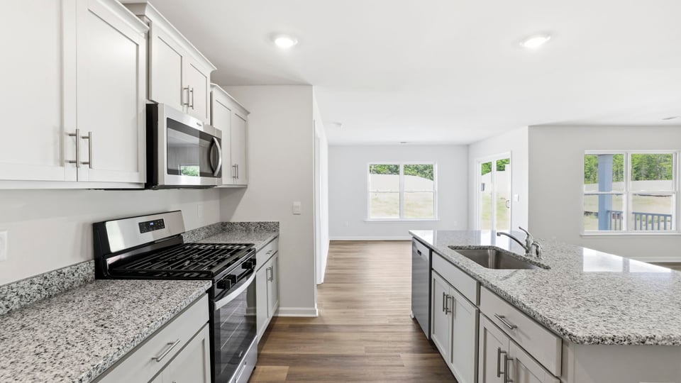 Kitchen with stainless steel appliances.
