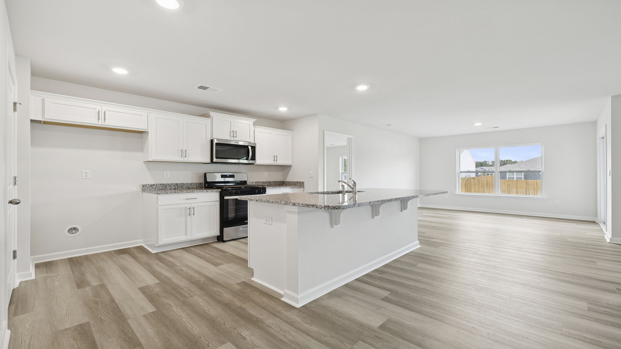 Open floor plan with lots of windows.