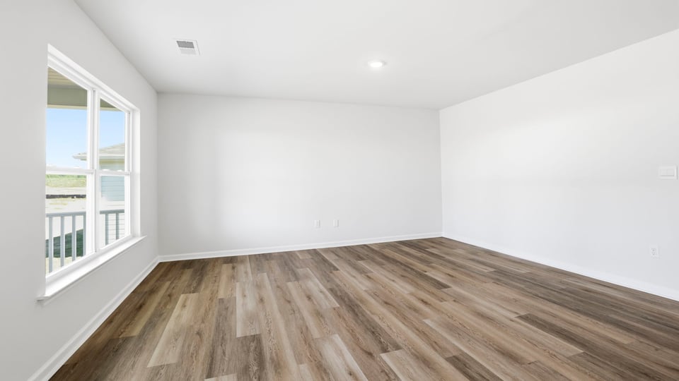 Family room with windows.