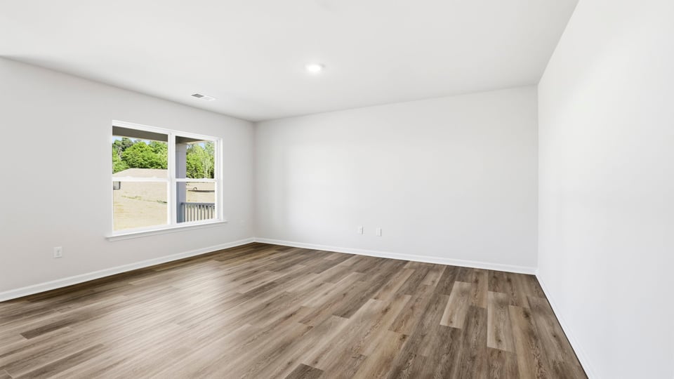 Family room with windows.