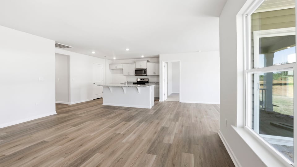 Family room with windows.
