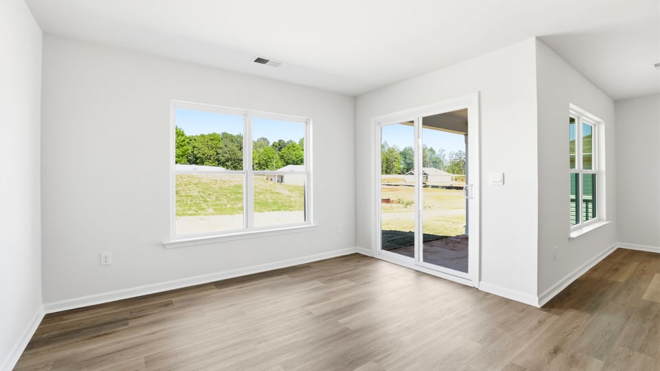 Family room with windows.