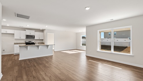 Family room with windows.