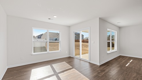 Family room with windows.
