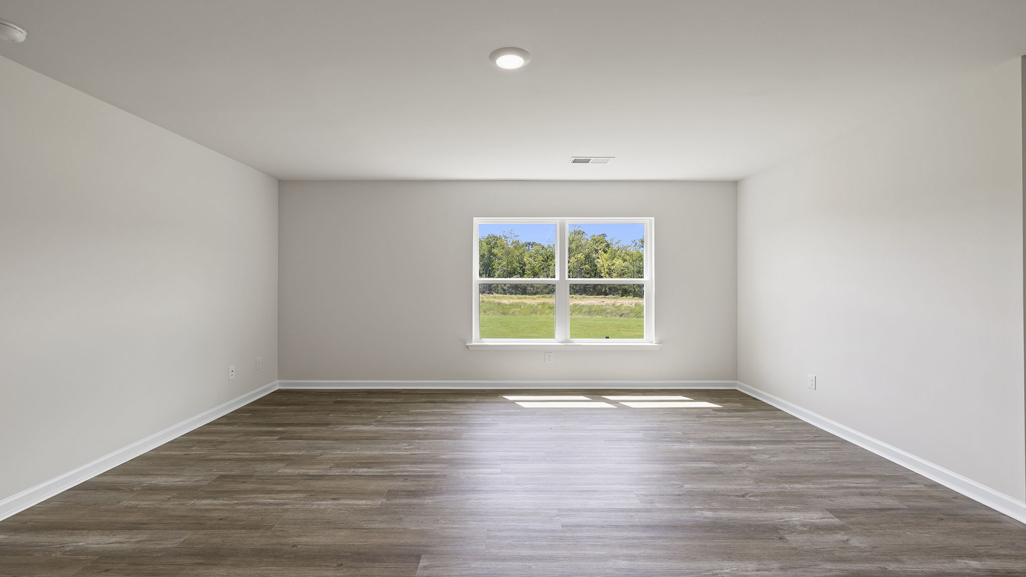 View of the family room with large window.