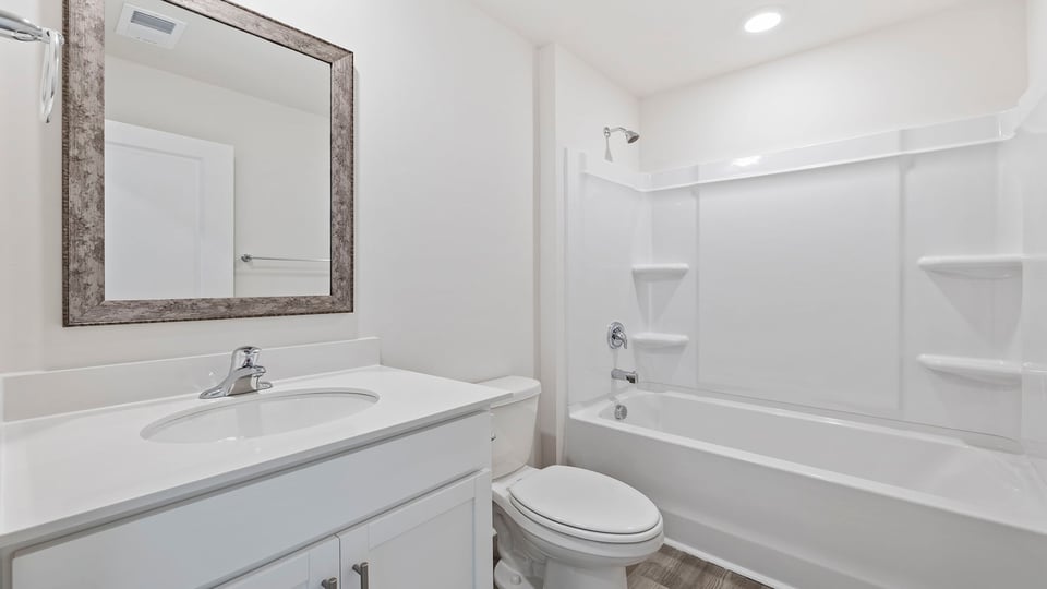 Bathroom with sink and tub.