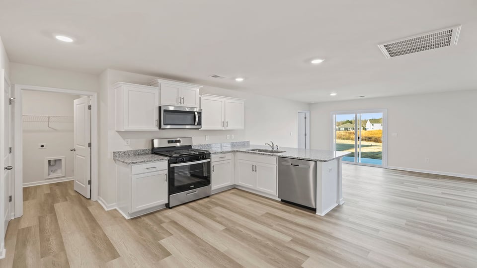 Kitchen with stainless steel appliances.