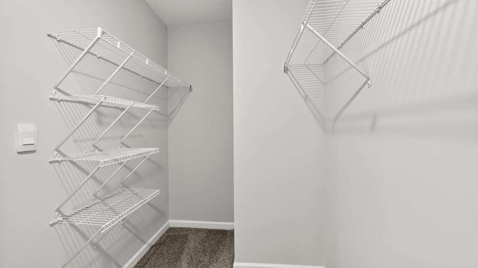 Primary closet with window.