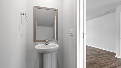 Half bathroom with toilet.