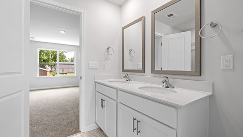 Bathroom with double vanity sink.