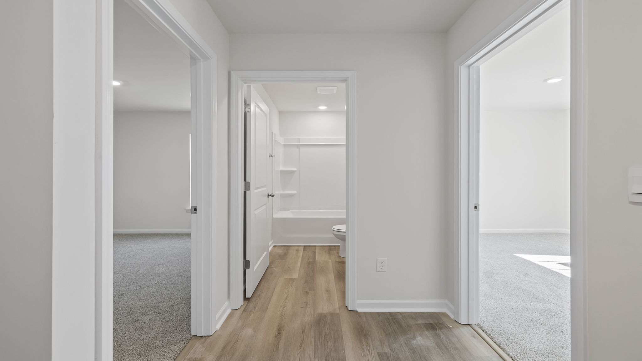 View of entrance to the bedrooms and hall bathroom.