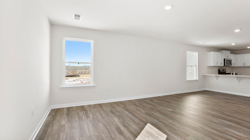 Family room with windows.