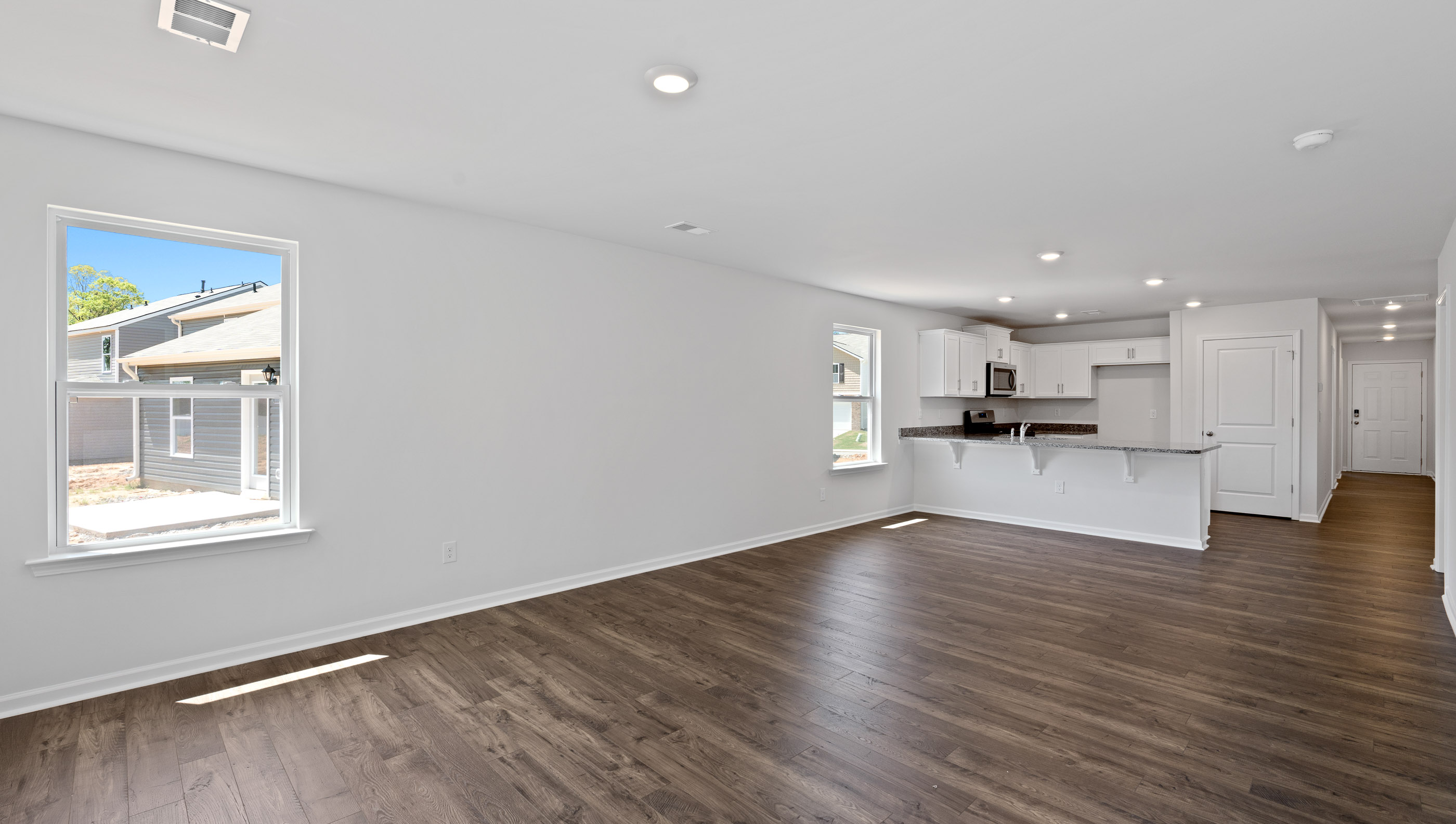 Family room with windows.