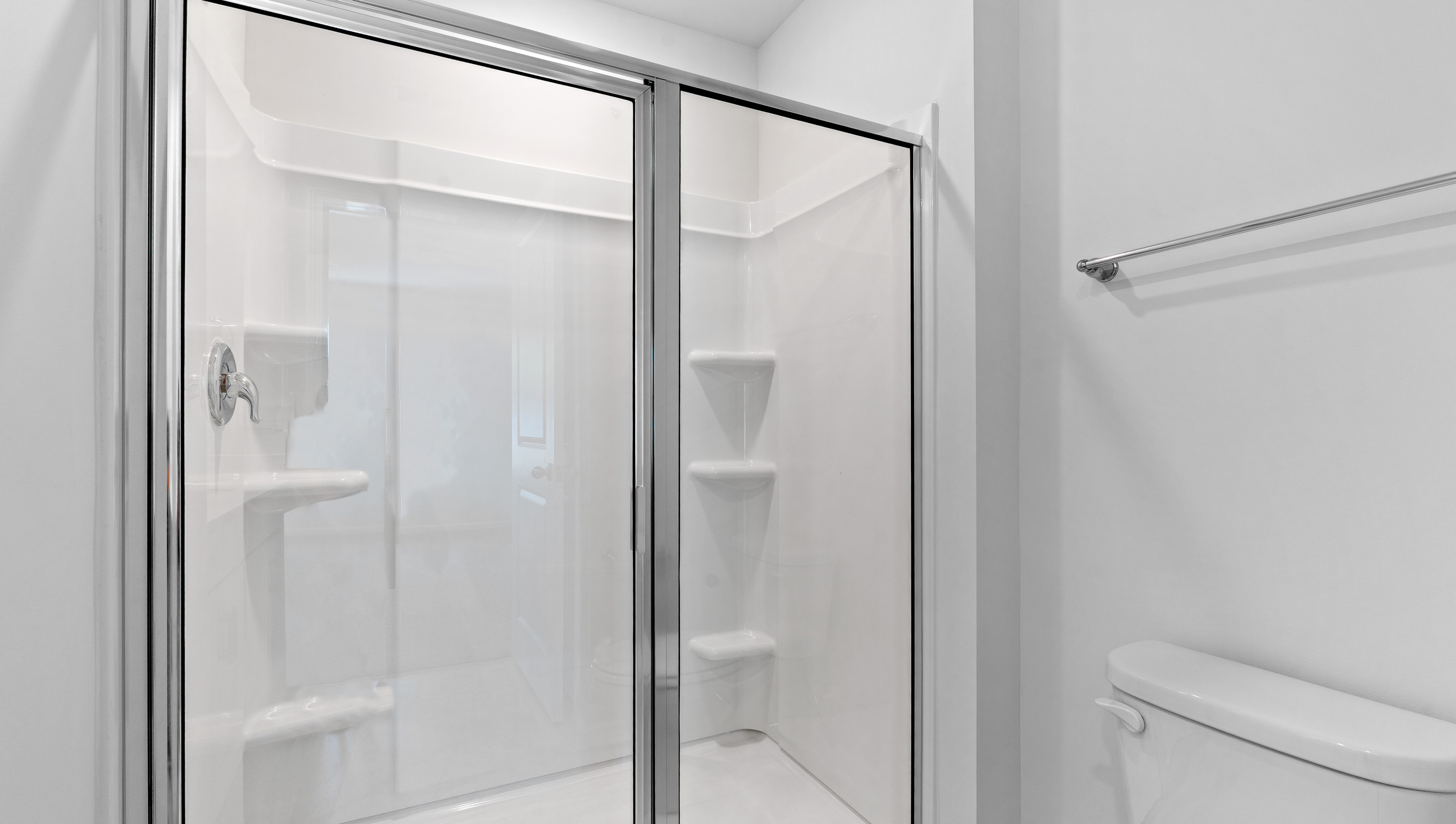 Bathroom with walk in shower.