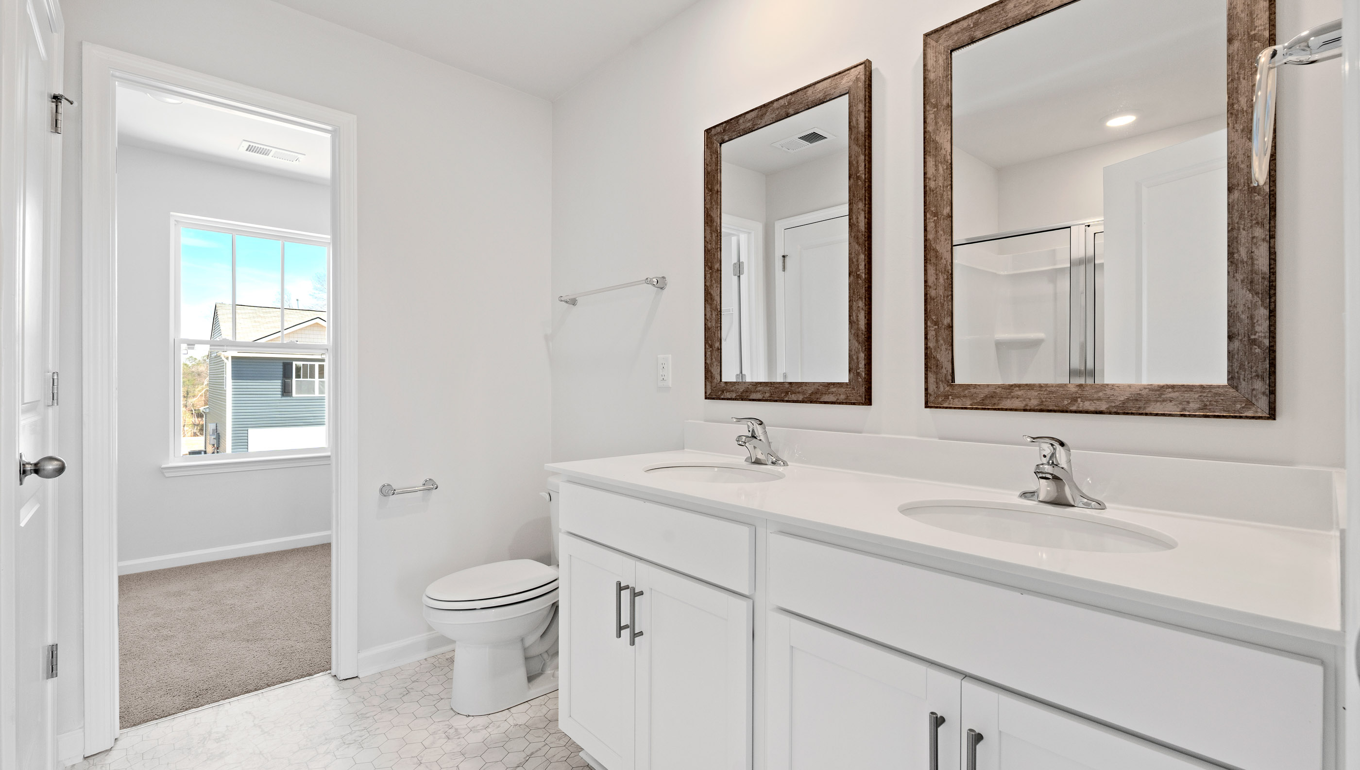Bathroom with double vanity sink.