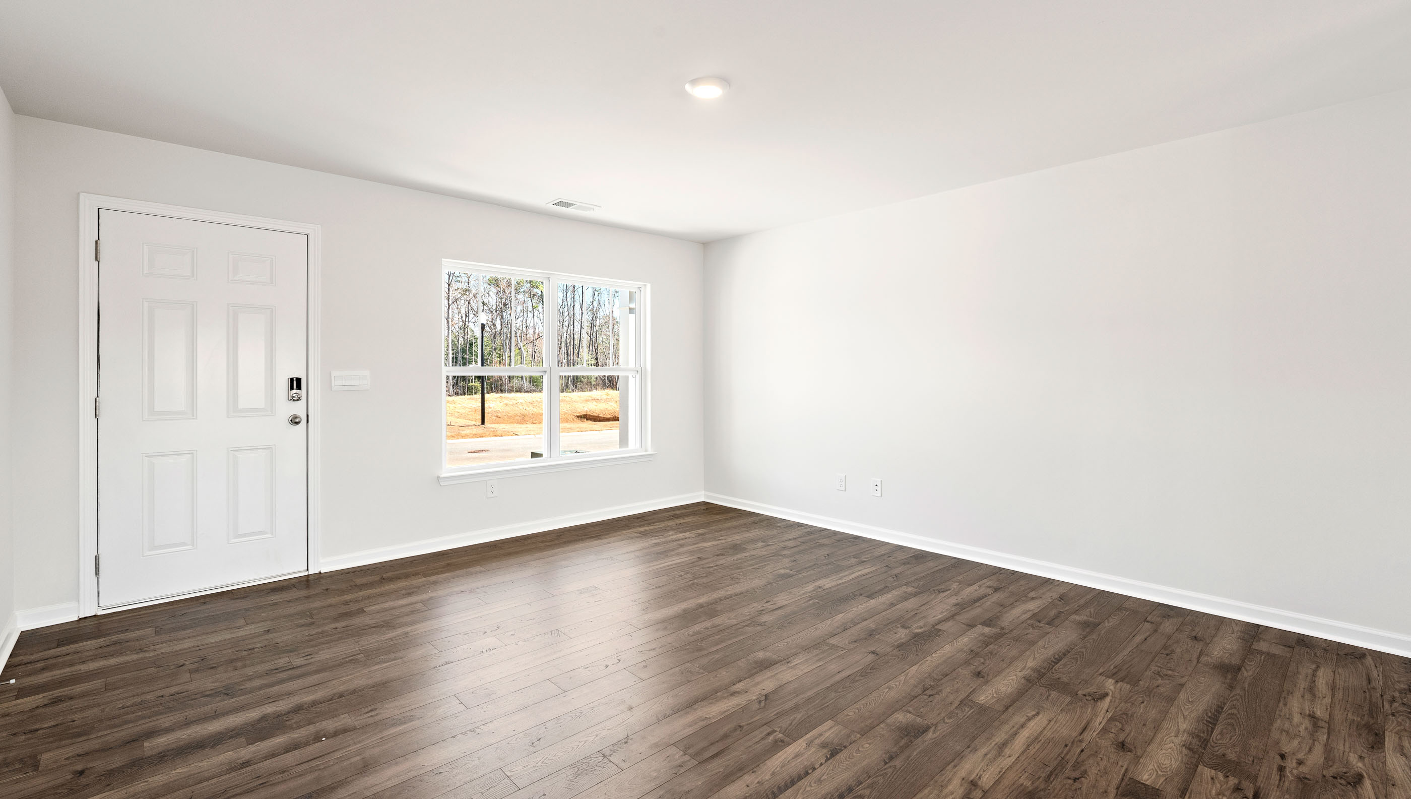 Family room with windows.