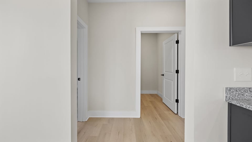 Hallway to primary bedroom.