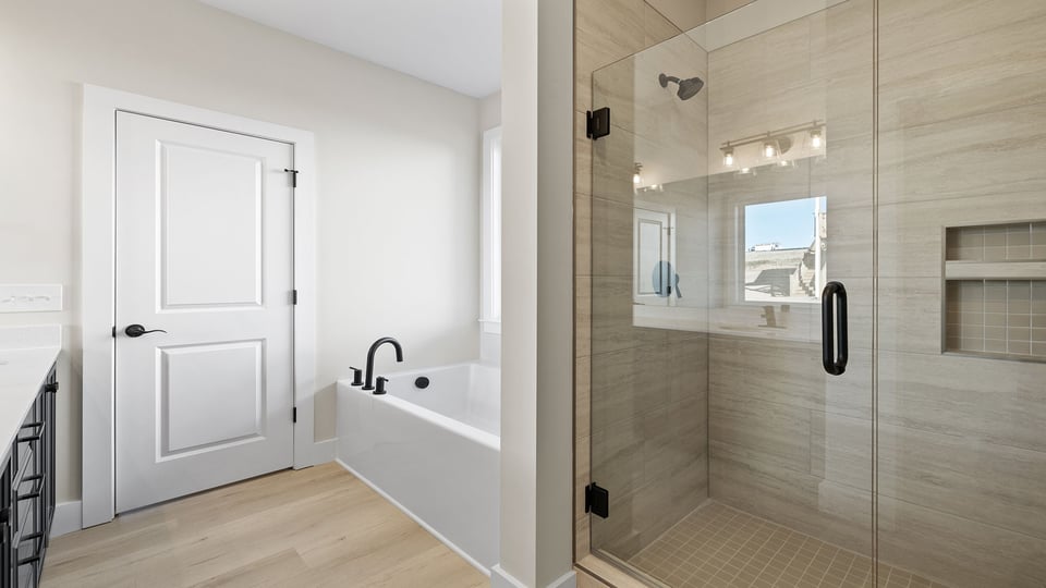 Primary bathroom with double vanity sinks.