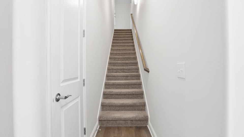 Staircase to loft area upstairs.