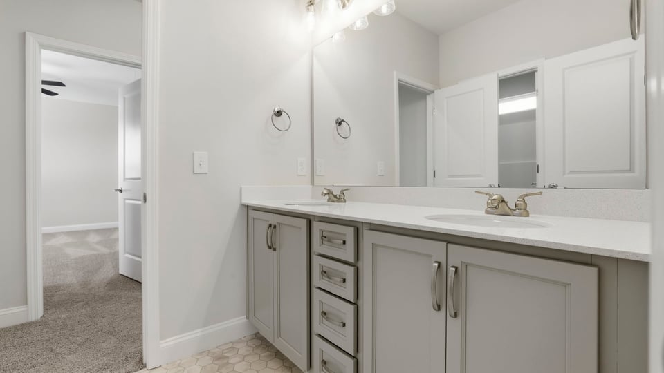 Bathroom with double vanity sink.