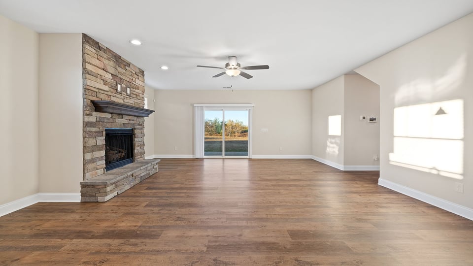 Kitchen and island with granite counter tops.