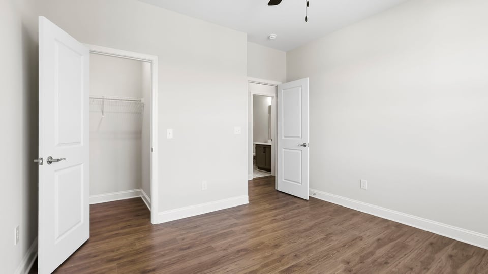 Kitchen with island and stainless steel appliances.
