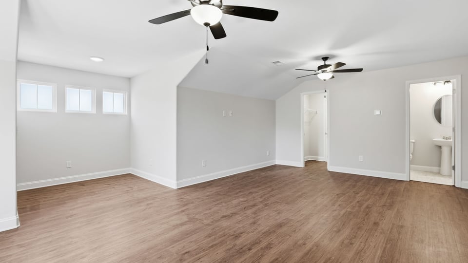 Bedroom with windows.