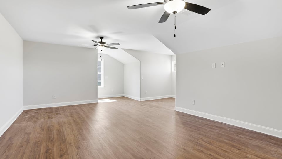 Bedroom with windows.