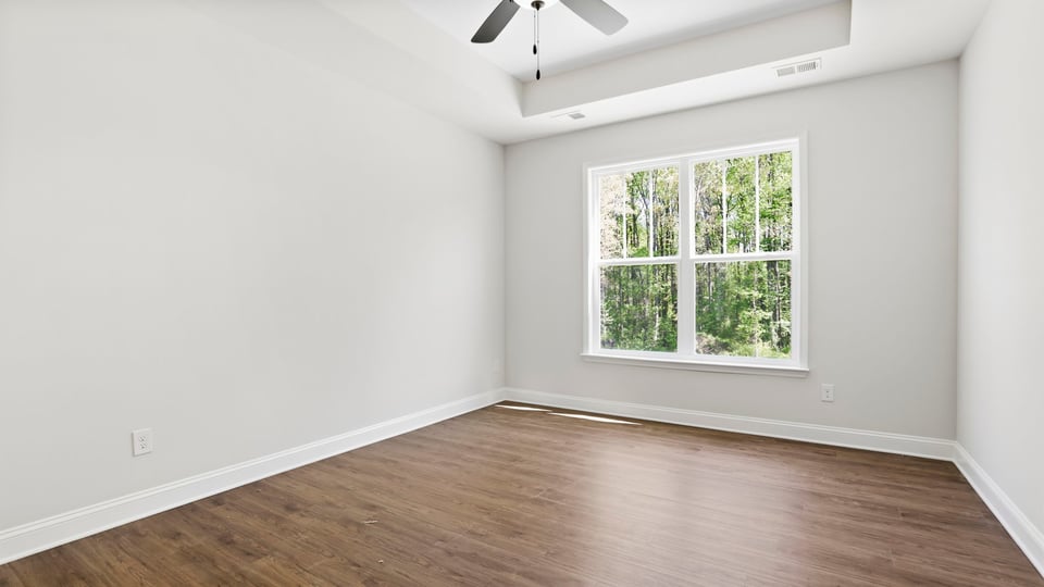 Bedroom with windows.
