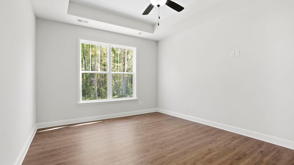 Bedroom with windows.