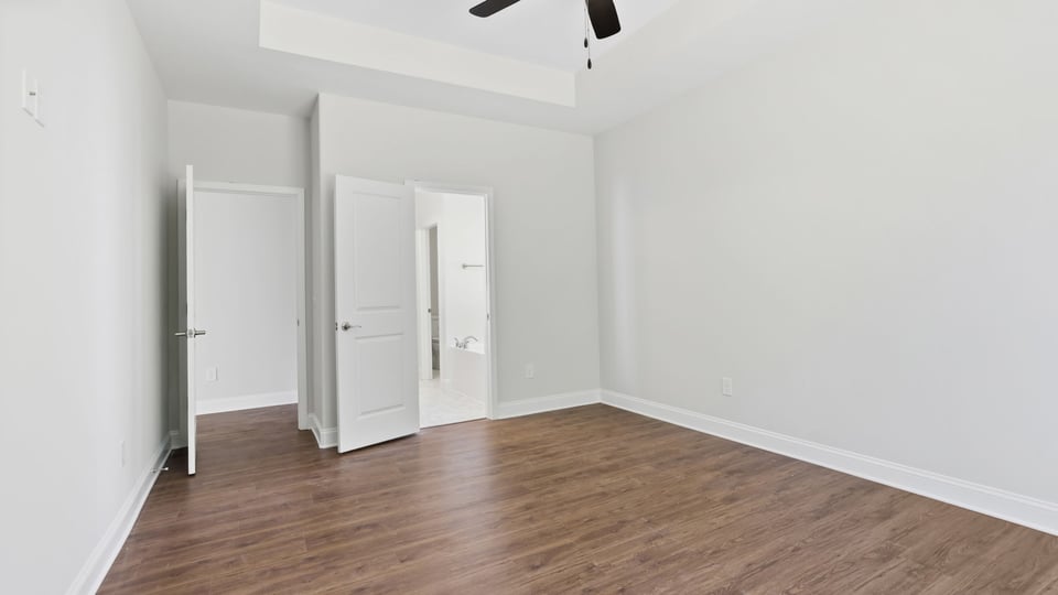 Bedroom with windows.