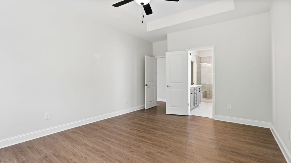 Bedroom with windows.