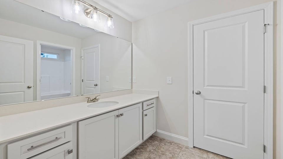 Bathroom with vanity.